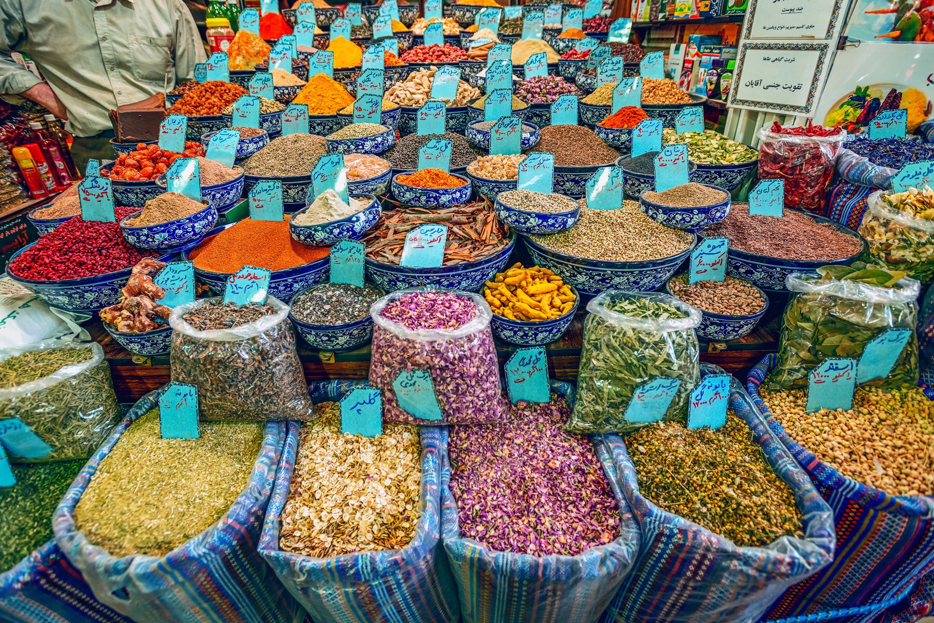 10/05/2019 Kerman,Kerman ProvinceIran, a huge variety of spices and herbs on a counter on a traditional Iranian eastern bazaar