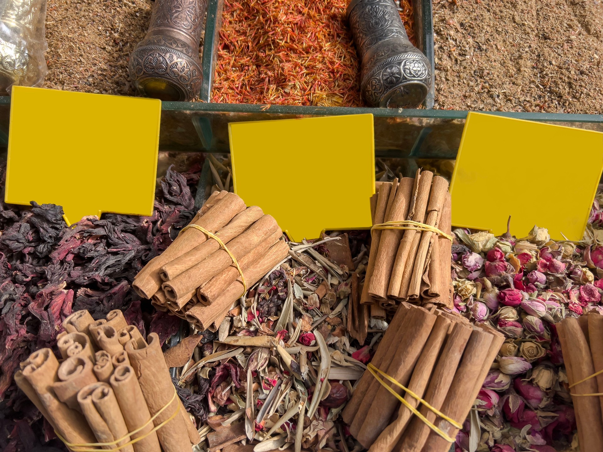 herbal tea and spices on bazaar market stall with blank tag labels